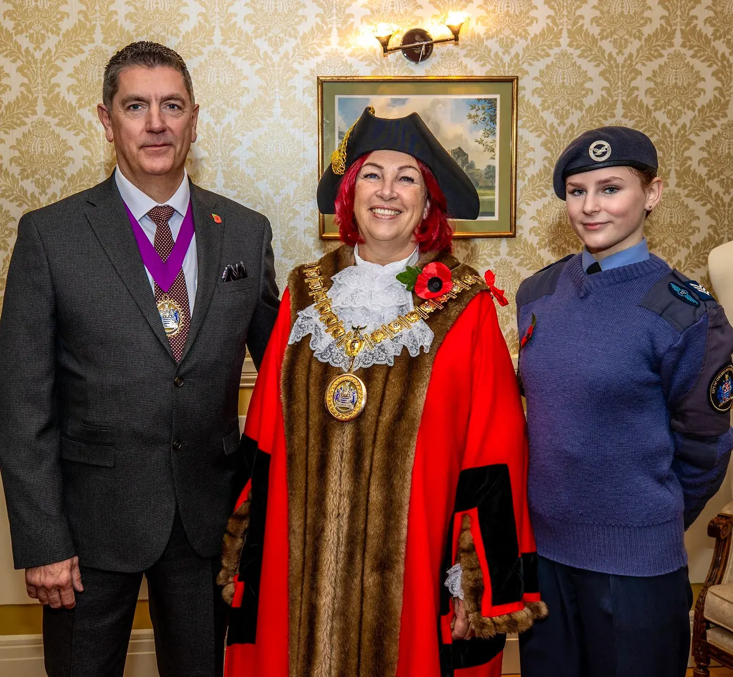 The mayor's consort, the mayor and an air cadet