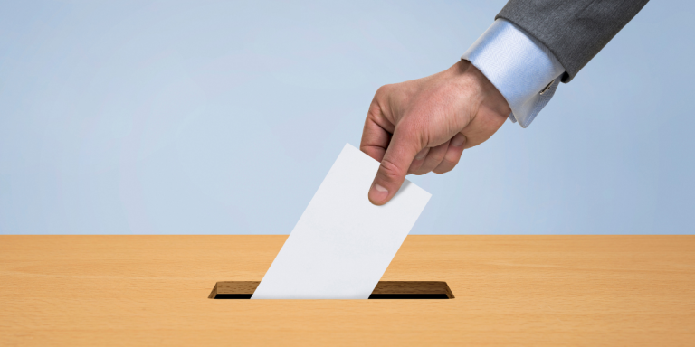 Voting In Ballot Box
