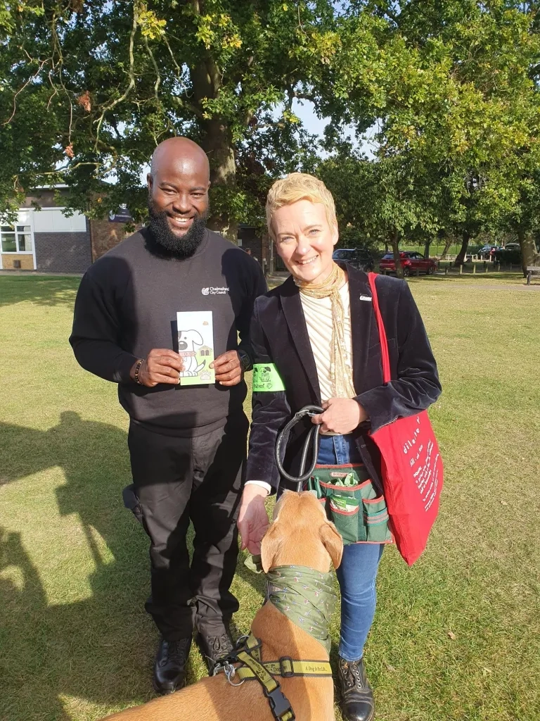 A Chelmsford City Council Officer And Councillor Rose Moore Are Pictured With Cllr Moore's Dog