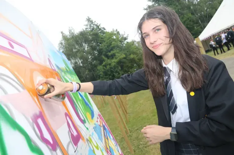 Astudent With A Spraycan