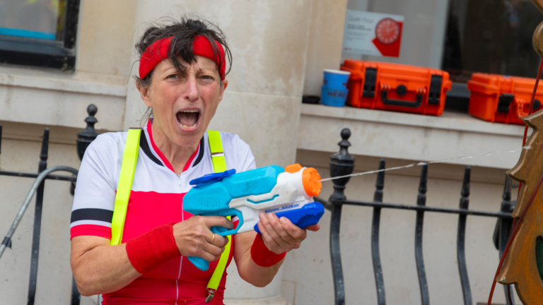 Performer With A Water Pistol In Tindal Square