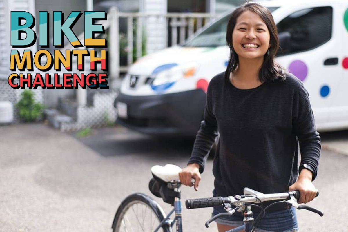 A Woman Stands With Her Bike