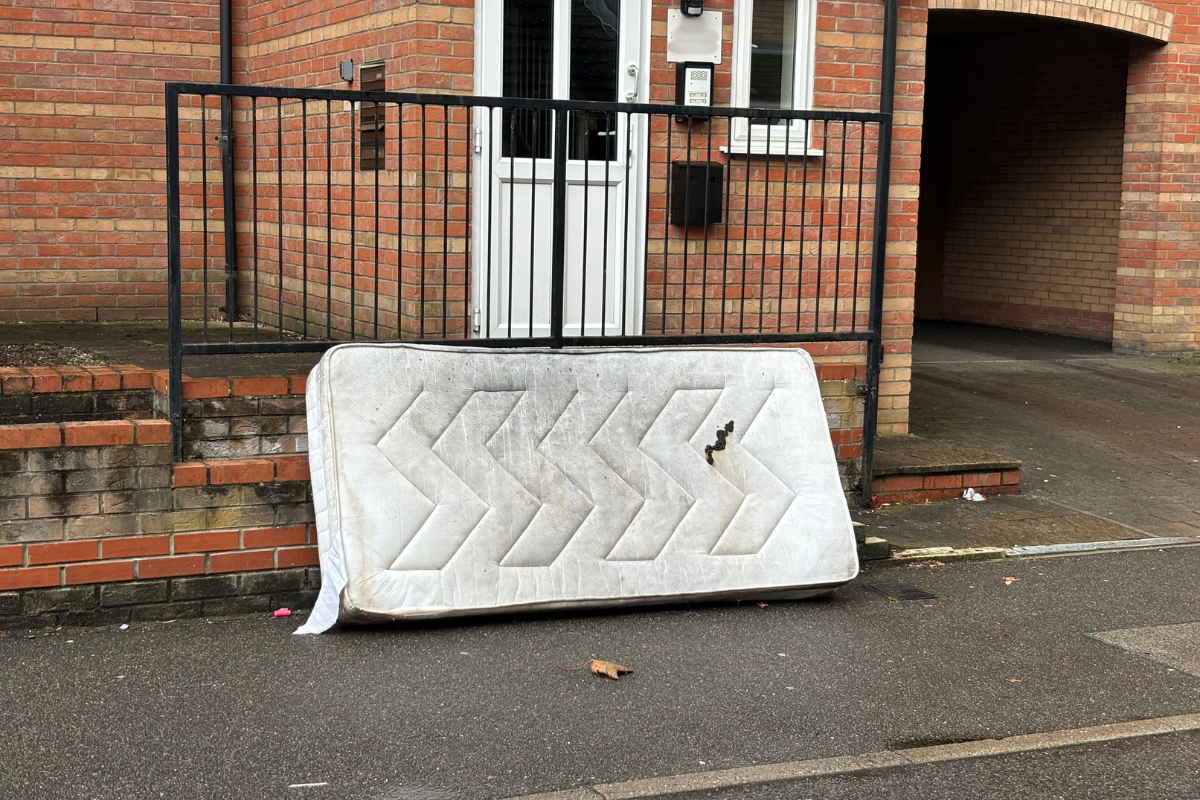 A Mattress Fly Tipped Outside Flats