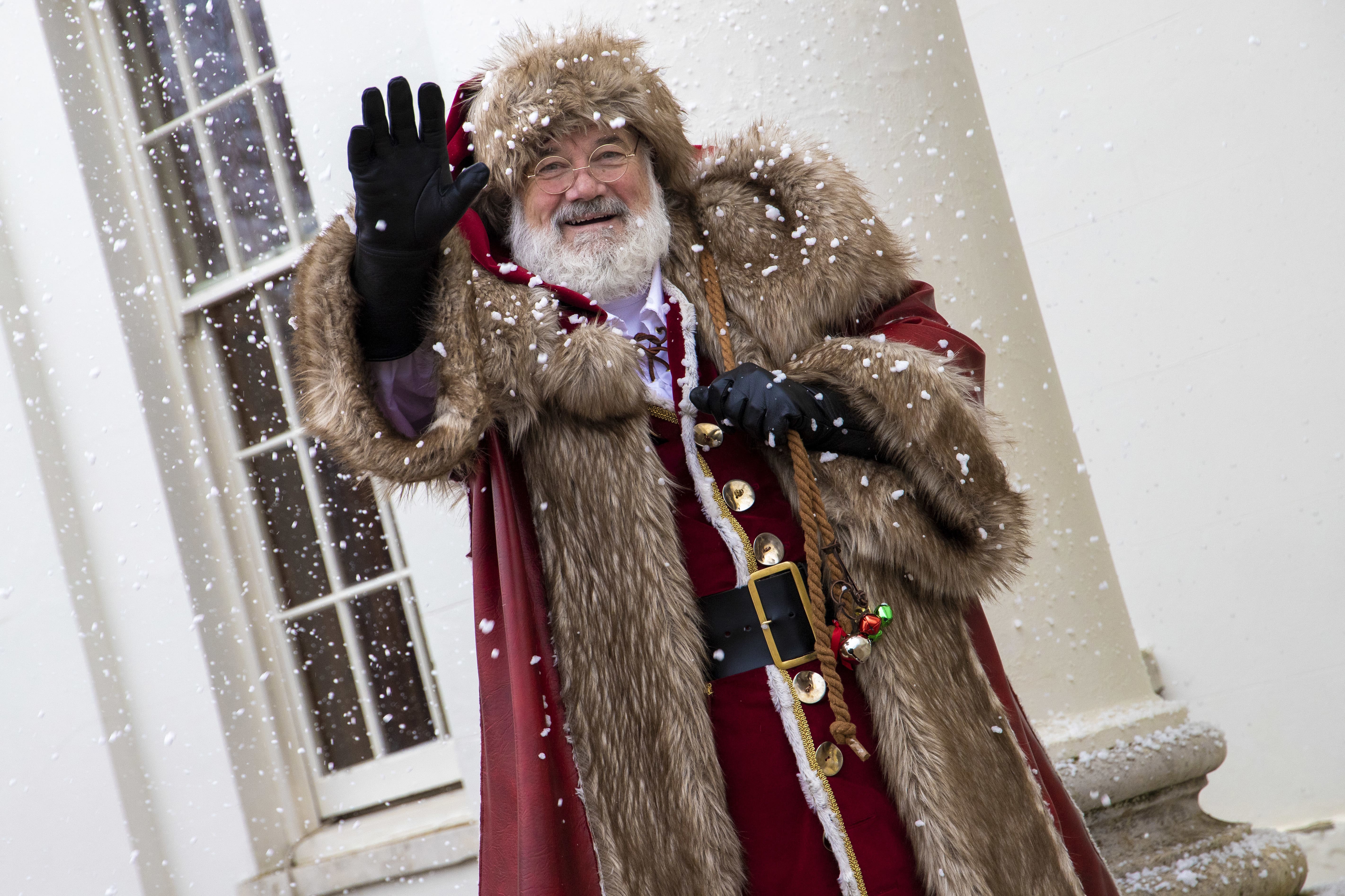 Father Christmas waving hello at Hylands