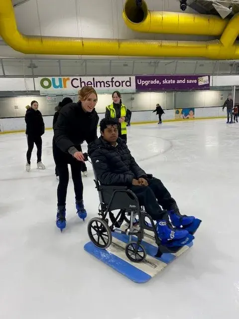 A Wheelchair User Takes Part In A Sport For Confidence Accessible Ice Skating Session