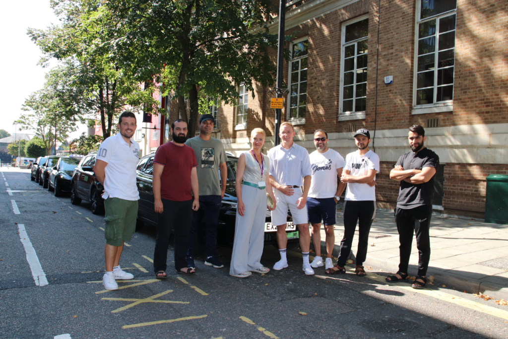 Councillor Rose Moore, Licensing Officers, And Drivers Of Electric Taxis At Fairfield Road Taxi Rank