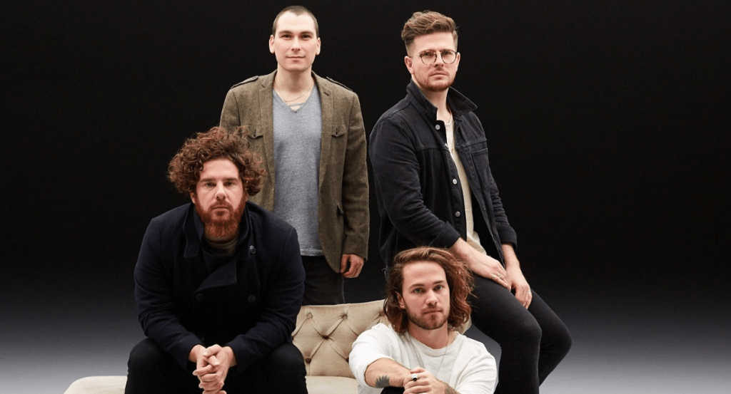Members Of The Band Black Pines Look Straight To Camera