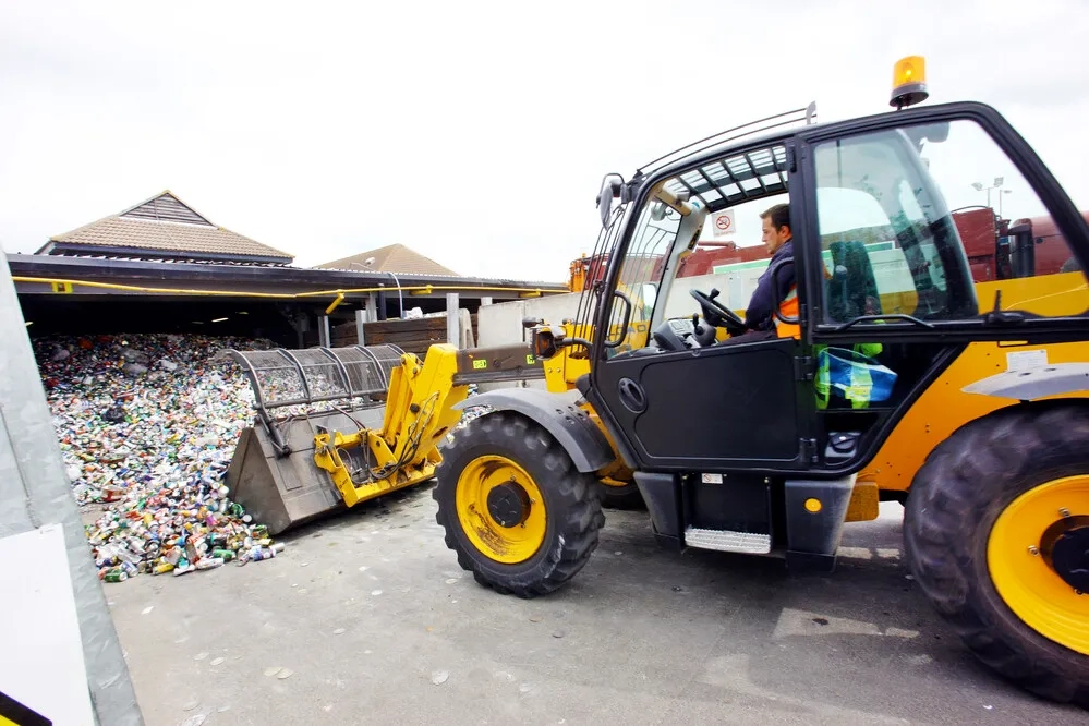 Machinery moving rubbish