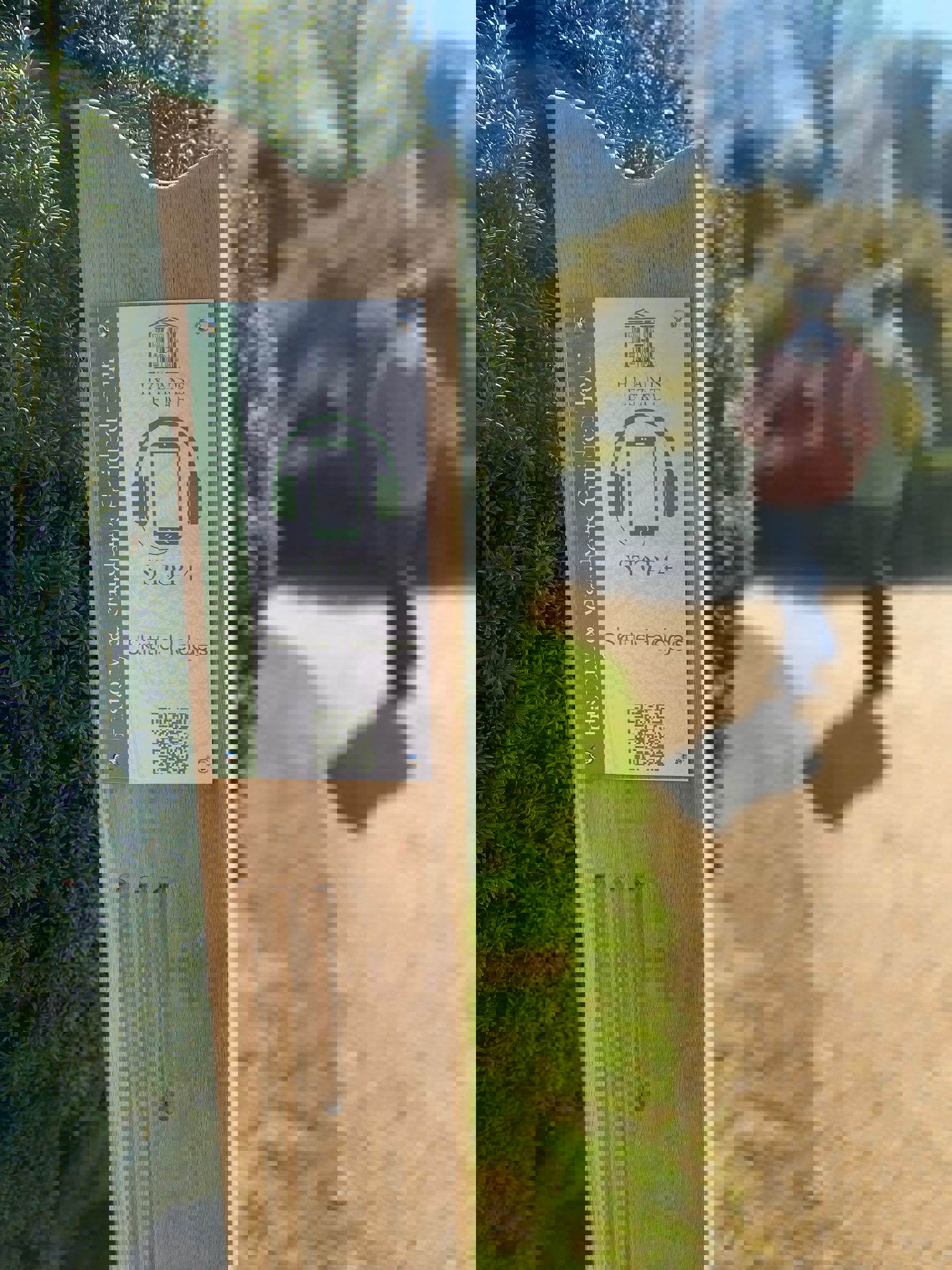 A Hylands multimedia tour post with a figure walking in the background