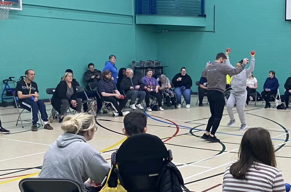 Sport For Confidence Class Play Boccia, The Winner And Assisstant Coach Are Dancing While Collecting Balls