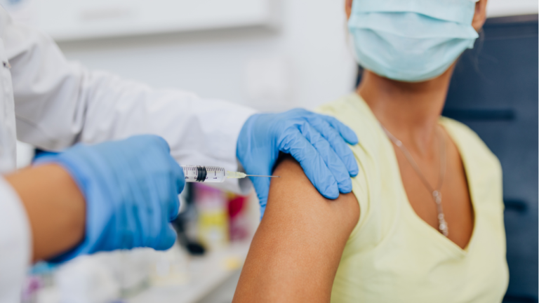 Person receiving COVID vaccine