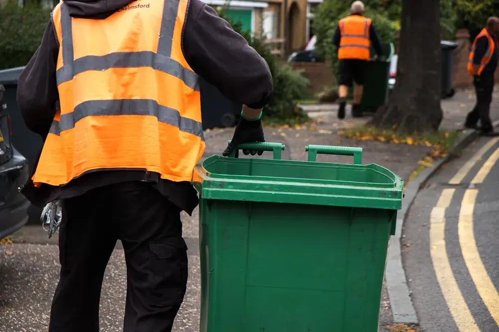 Man With Green Wheelie Bin