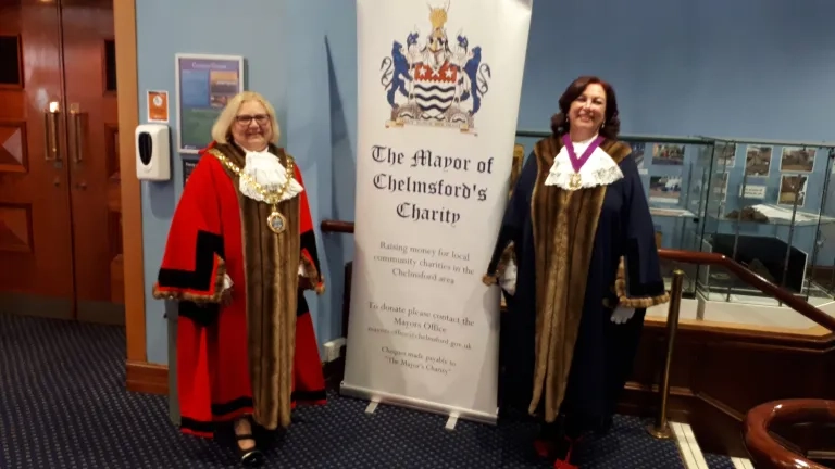 Mayor Deakin And Deputy Mayor Mascot wearing official robes and chains