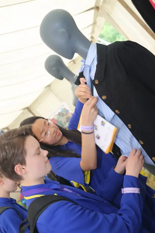 Students Visit A Stand