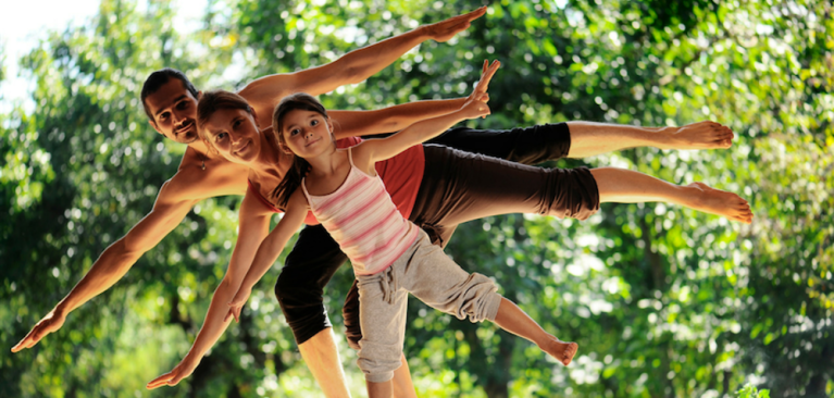 3 family members doing yoga
