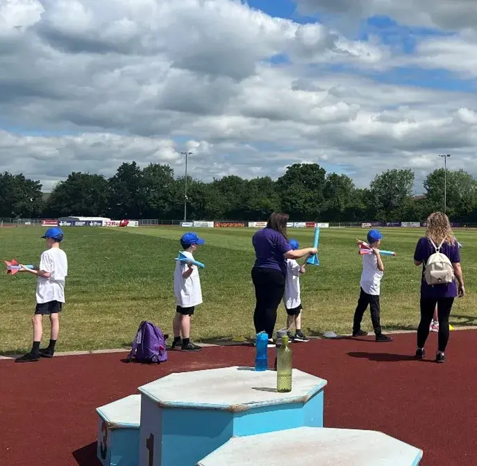 Children Line Up To Take Part In A Foam Rocket Race