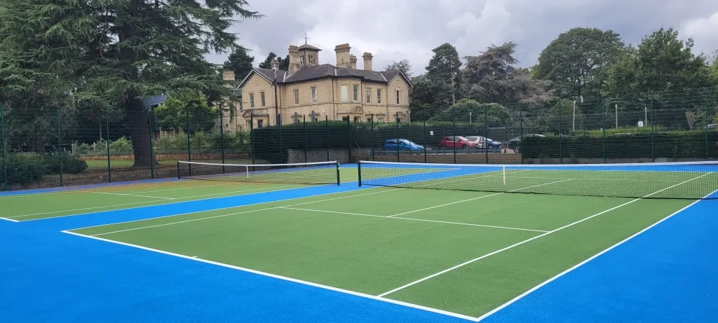 Oaklands Park tennis court after revamp with museum in background