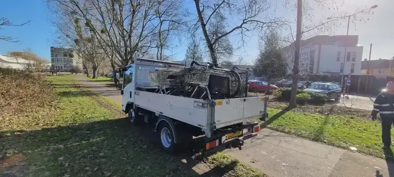Truck full of waste and litter removed from river