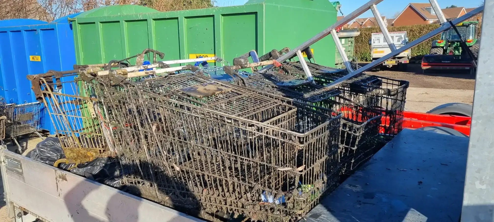 Rusted shopping trolleys pulled from river