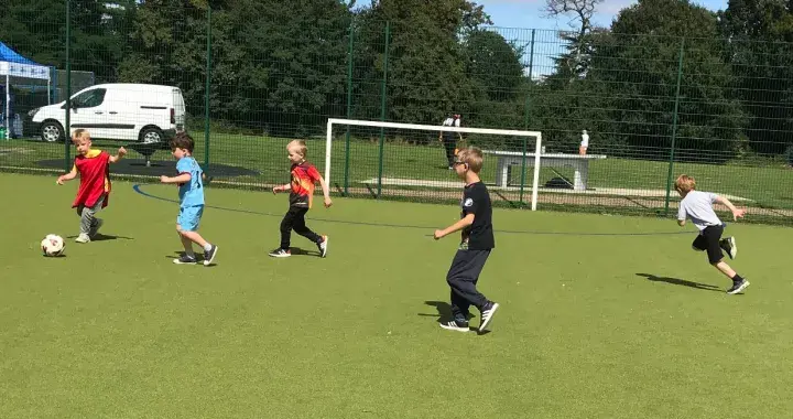 Football At Play In The Park