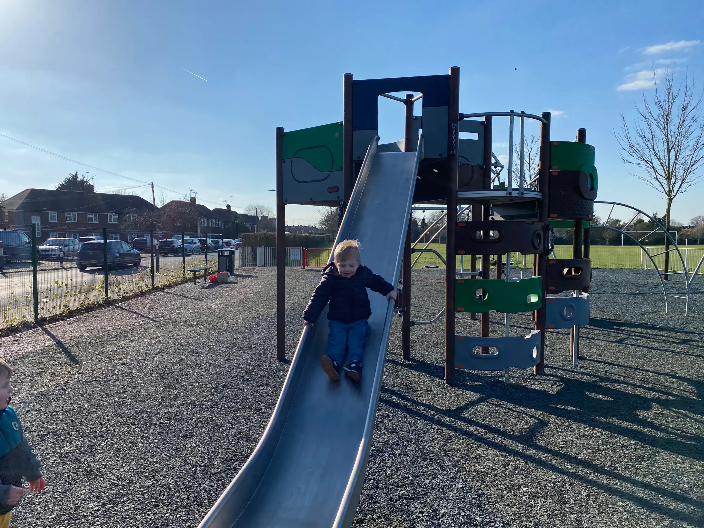 Children Playing On Slide In Melbourne Park