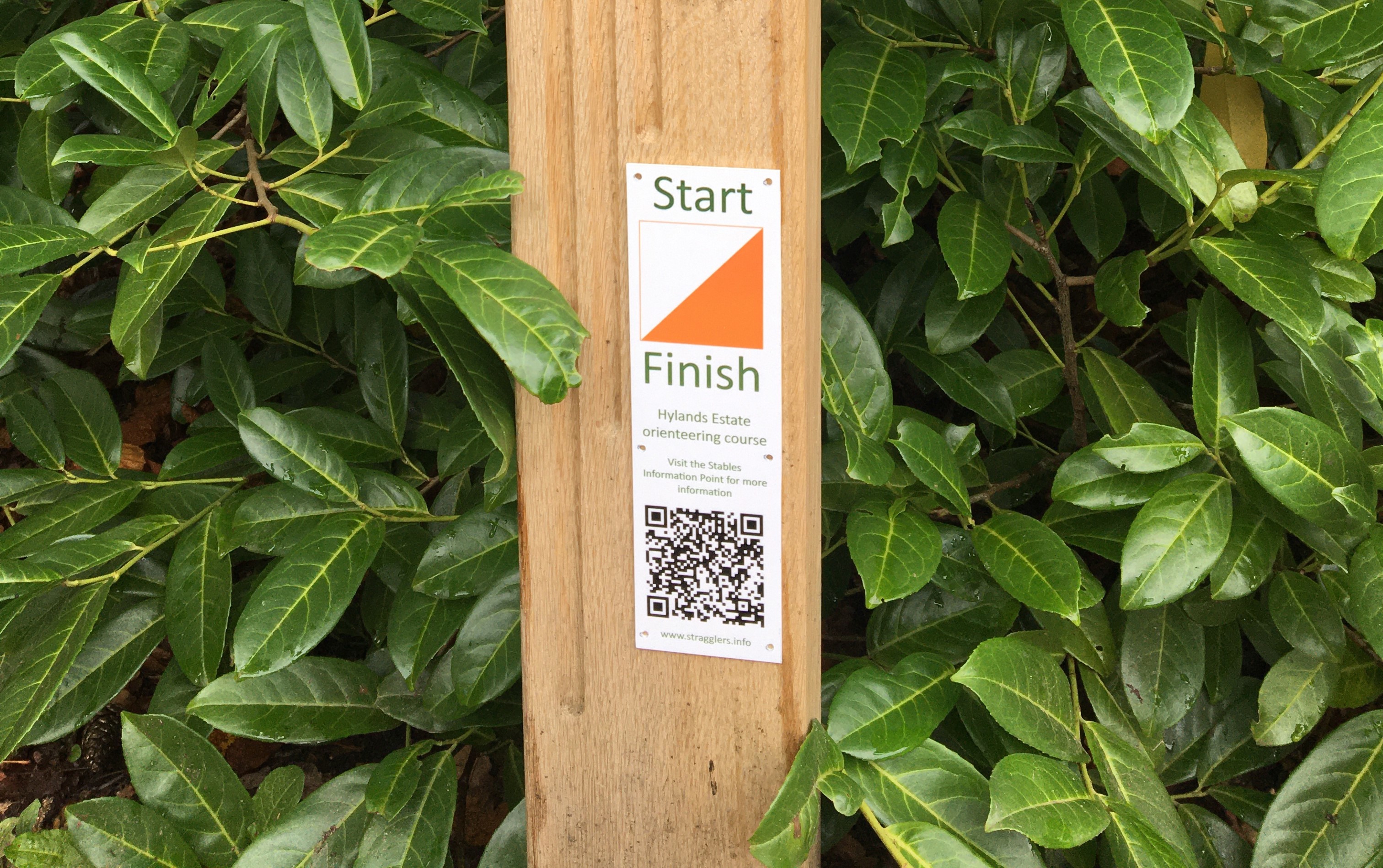 Hylands orienteering marker on wooden post