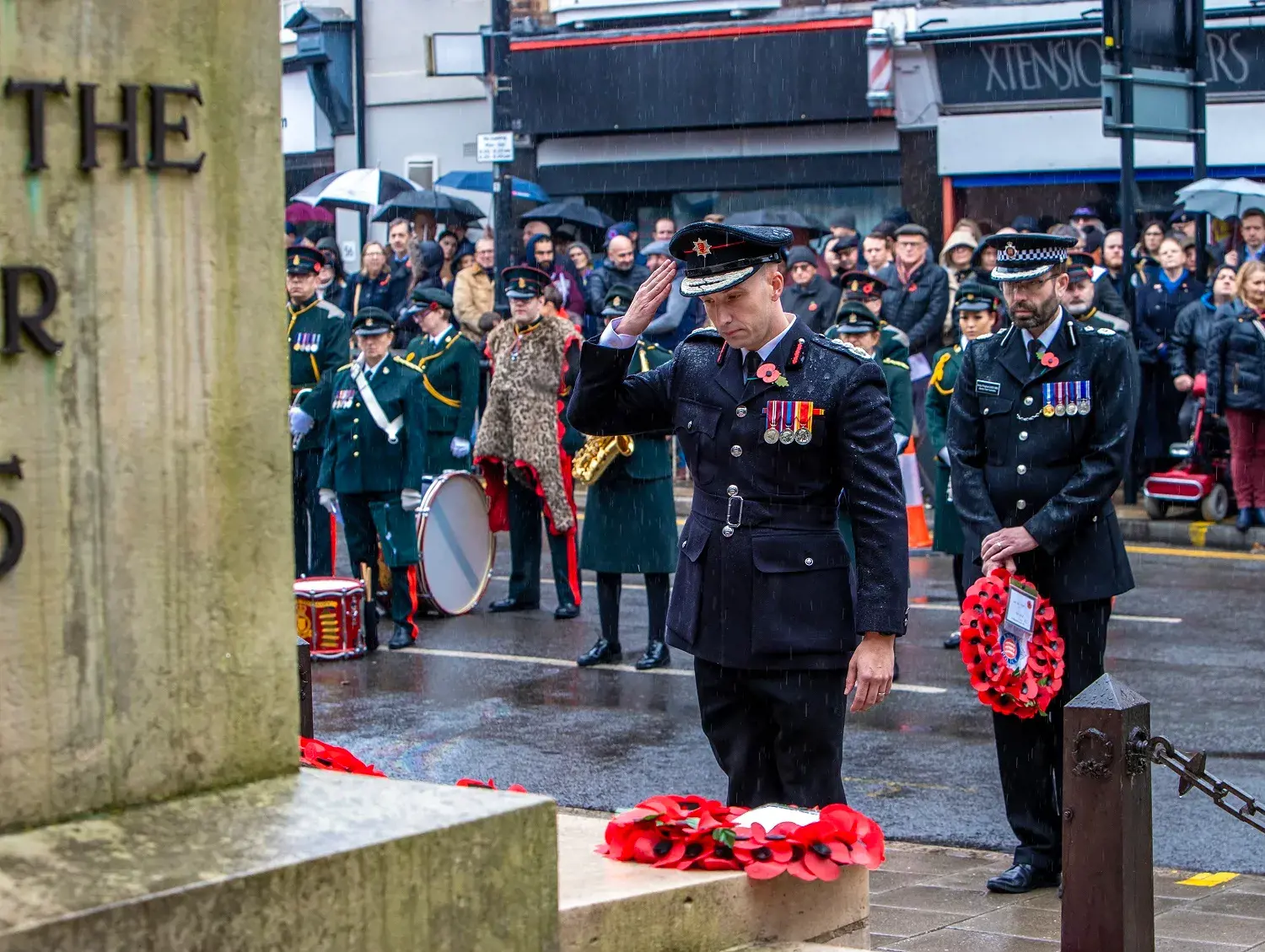 Essex police laying down wreaths at war memorial