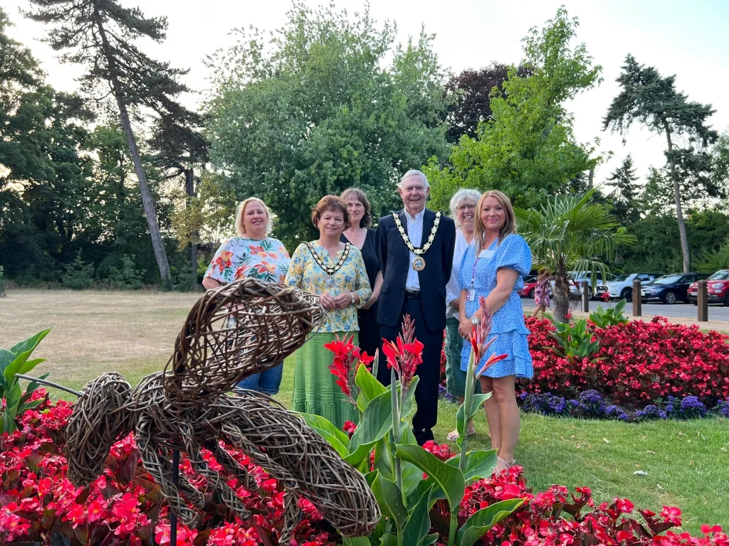 Group photo with newly installed bee sculptures