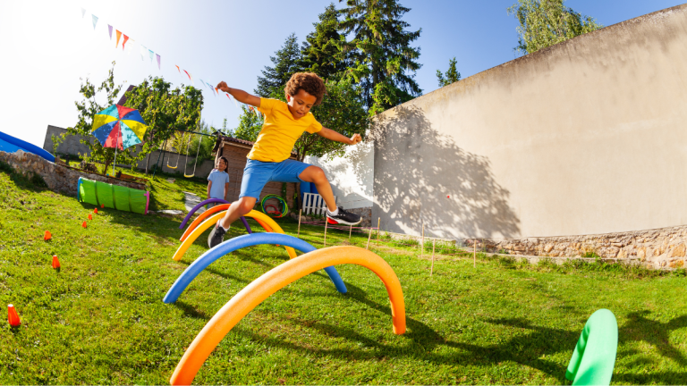 Children Playing On Mini Obstacle Course